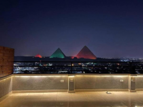 Grand museum & Full pyramids View W Roof Top